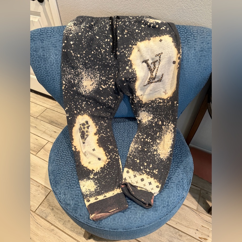 LV Logo Sweatpants sz lg. no tags excellent condition leopard animal prints